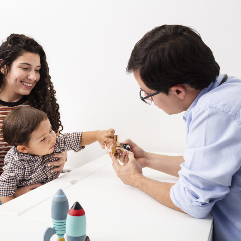 medium-shot-baby-being-curious-doctor-s-visit